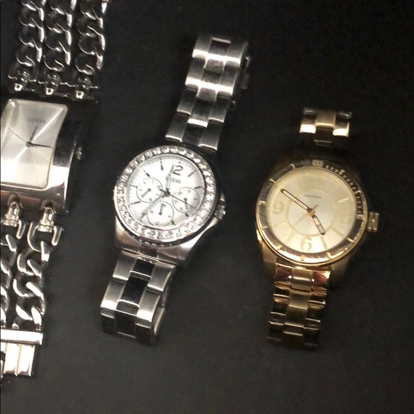 2 silver Guess Watches and 1 Tommy Hilfiger watch